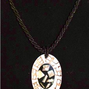 Beautiful Beaded necklace with resin shell pendant